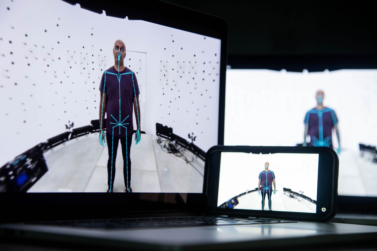 Multiple screens showing a human avatar with lines and dots indicating movement vectors.